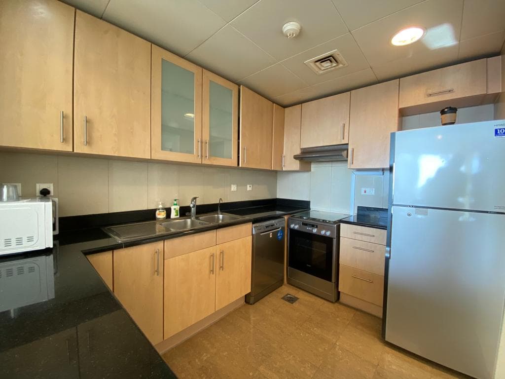 Spacious 2BR | Fully Furnished | Vibrant Community — 10