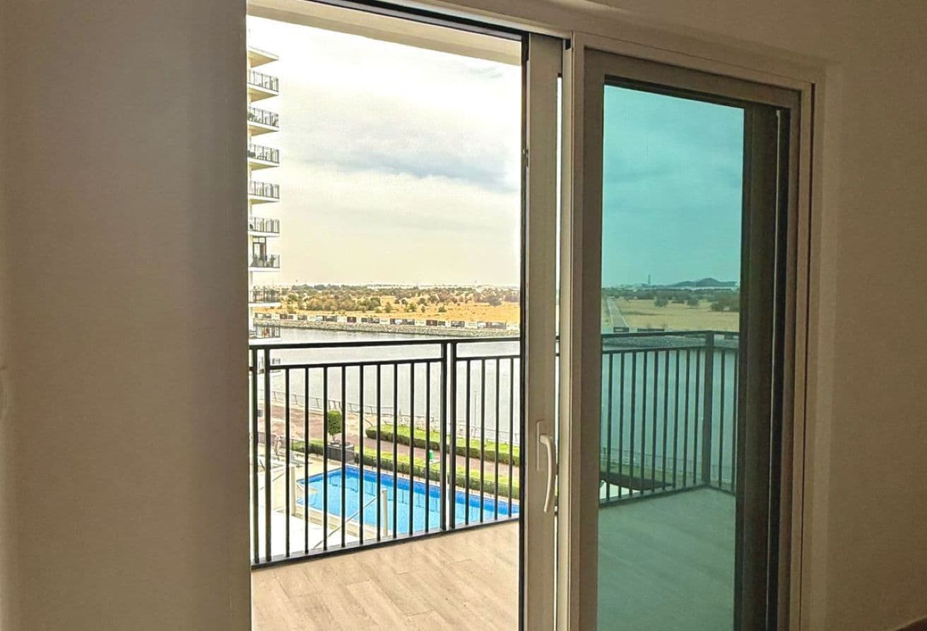 Canal & Pool View | Elegant 2BR | Ideal Location — 9
